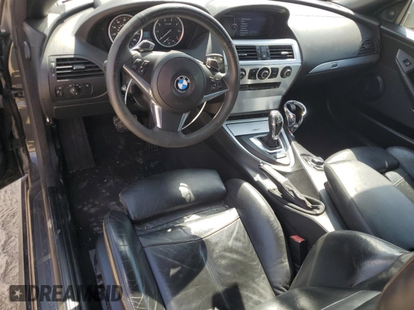 2010 BMW 6 Series 650i z VIN WBAEB5C52AC225960, wystawiony jako Copart lot #71639634 z przebiegiem 114 696 mil mil oraz Czysty tytuł • Clean title. Historia ofert i sprzedaży dostępna na DreamBid. Obrazek 8.