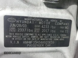 2004 Hyundai Sonata GLS with VIN KMHWF35H34A920659, listed as a Copart auction lot 77813554 with 76,938 mi miles and Clean Title. Bid and sale history available at carsss.com. Image 12.