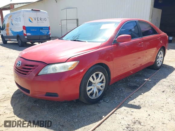2009 Toyota Camry with VIN 4T4BE46K79R129774, listed as a IAAI auction lot 42152209 with 184,786 mi miles. Bid and sale history available at carsss.com. Image 2.