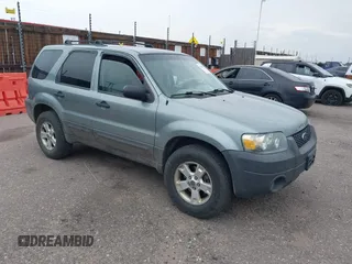 2005 Ford Escape XLT with VIN 1FMYU93165KA02357, listed as a IAAI auction lot 42858975 with 119,905 mi miles and . Bid and sale history available at DreamBid. Image 1.