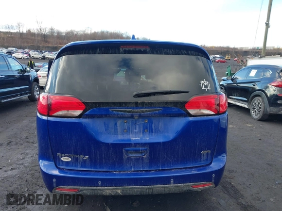 2020 Chrysler Pacifica Launch Edition z VIN 2C4RC3BG9LR252124, wystawiony jako IAAI lot #41689415 z przebiegiem 53 455 mil mil oraz . Historia ofert i sprzedaży dostępna na DreamBid. Obrazek 16.
