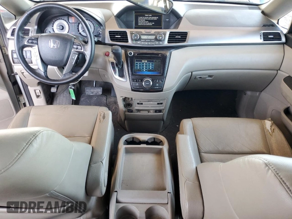 2014 Honda Odyssey Touring с VIN 5FNRL5H94EB110797, выставлен на аукционе Copart как лот 60702365 с пробегом 106 131 миль миль и Списание • Salvage title. История ставок и продаж доступна на DreamBid. Изображение 8.