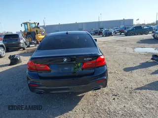 2018 BMW 5 Series 530i with VIN WBAJA5C59JWA38170, listed as a IAAI auction lot 41682219 with 61,990 mi miles and . Bid and sale history available at carsss.com. Image 16.