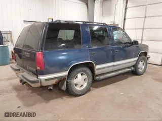 1996 Chevrolet Tahoe with VIN 1GNEK13R3TJ359476, listed as a IAAI auction lot 39579992 with 258,505 mi miles. Bid and sale history available at carsss.com. Image 4.