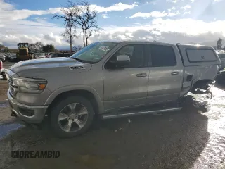 2020 Ram 1500 Laramie with VIN 1C6SRFJM4LN215320, listed as a Copart auction lot 41479055 with 223,742 mi miles and Salvage title. Bid and sale history available at DreamBid. Image 1.