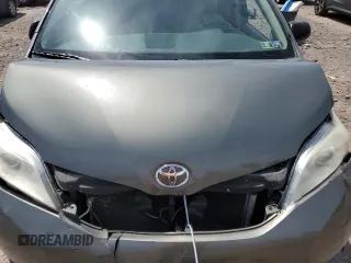 2012 Toyota Sienna z VIN 5TDKA3DCXCS010810, wystawiony jako Copart lot #54872735 z przebiegiem 188 973 mil mil oraz Szkoda całkowita • Salvage title. Historia ofert i sprzedaży dostępna na DreamBid. Obrazek 12.