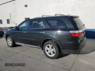 2013 Dodge Durango Crew z VIN 1C4RDJDG7DC584541, wystawiony jako Copart lot #55957665 z przebiegiem 142 639 mil mil oraz Czysty tytuł • Clean title. Historia ofert i sprzedaży dostępna na DreamBid. Obrazek 2.