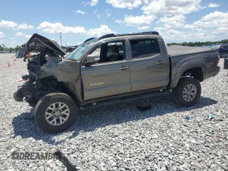2014 Toyota Tacoma PreRunner with VIN 3TMJU4GN2EM165750, listed as a Copart auction lot 56969605 with Not Provided miles and Clean Title. Bid and sale history available at DreamBid. Image 1.