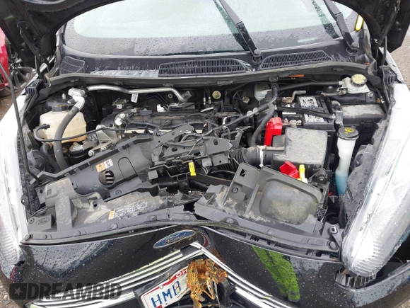2018 Ford Fiesta SE z VIN 3FADP4BJ0JM104163, wystawiony jako IAAI lot #42306860 z przebiegiem 45 992 mil mil oraz . Historia ofert i sprzedaży dostępna na DreamBid. Obrazek 10.