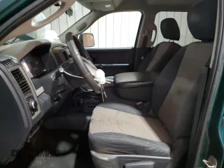 2011 Ram 2500 Laramie Longhorn with VIN 3D7UT2CL8BG504097, listed as a Copart auction lot 57214505 with 288,752 mi miles and Salvage title. Bid and sale history available at DreamBid. Image 7.
