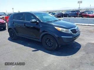 2013 Kia Sportage LX with VIN KNDPBCA25D7449584, listed as a IAAI auction lot 42489414 with 100,993 mi miles and . Bid and sale history available at DreamBid. Image 1.