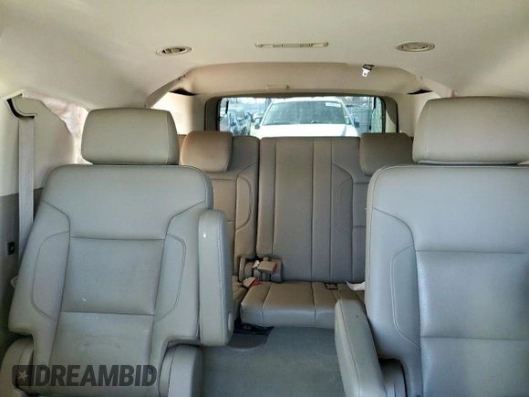 2015 Chevrolet Suburban LTZ with VIN 1GNSKKKC2FR634654, listed as a Copart auction lot 50337415 with 150,255 mi miles and Salvage Title. Bid and sale history available at DreamBid. Image 10.