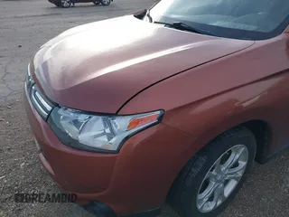 2014 Mitsubishi Outlander SE z VIN JA4AZ3A31EZ008884, wystawiony jako IAAI lot #41825440 z przebiegiem 171 232 mil mil oraz . Historia ofert i sprzedaży dostępna na DreamBid. Obrazek 6.