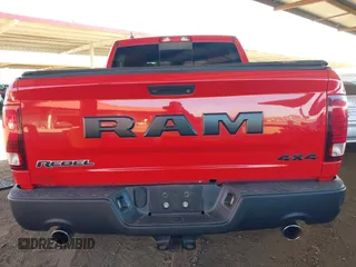 2016 Ram 1500 Rebel z VIN 1C6RR7YT3GS175255, wystawiony jako IAAI lot #42085582 z przebiegiem 67 971 mil mil oraz . Historia ofert i sprzedaży dostępna na DreamBid. Obrazek 16.
