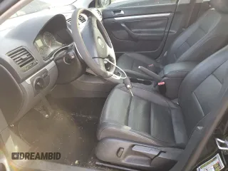 2009 Volkswagen Jetta z VIN 3VWTZ71K99M252459, wystawiony jako Copart lot #77893704 z przebiegiem 181 022 mil mil oraz Szkoda całkowita • Salvage title. Historia ofert i sprzedaży dostępna na DreamBid. Obrazek 7.