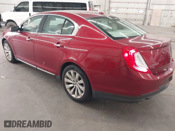 2013 Lincoln MKS with VIN 1LNHL9DK5DG614352, listed as a IAAI auction lot 42628466 with 180,028 mi miles and . Bid and sale history available at DreamBid. Image 3.