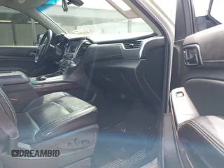 2016 Chevrolet Tahoe LS with VIN 1GNSCAKC5GR354722, listed as a IAAI auction lot 41812839 with 146,533 mi miles and . Bid and sale history available at DreamBid. Image 5.