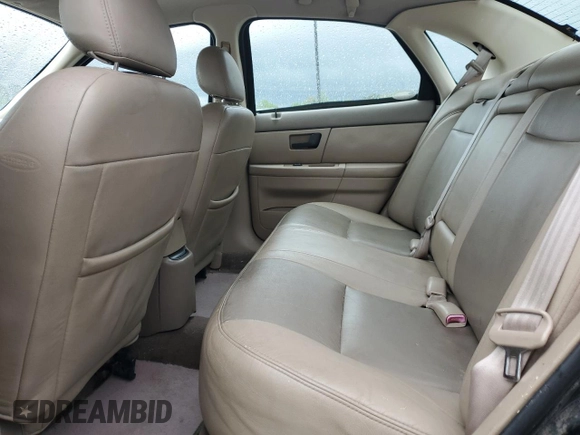 2003 Ford Taurus SEL Deluxe with VIN 1FAHP56S83A225002, listed as a Copart auction lot 49456975 with 199,759 mi miles and Salvage Title. Bid and sale history available at DreamBid. Image 10.