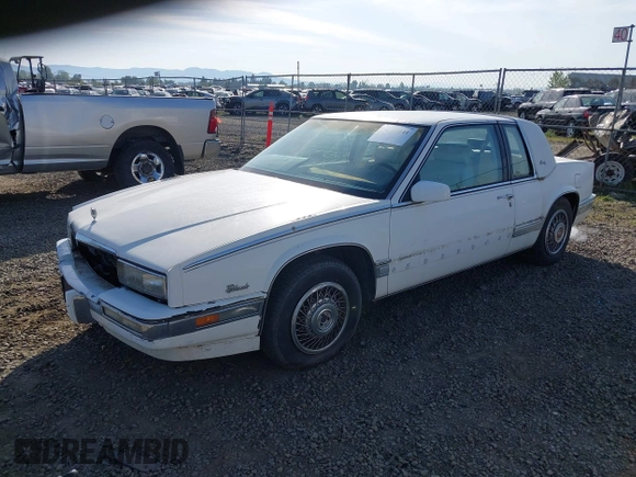 1989 Cadillac Eldorado with VIN 1G6EL1150KU621587, listed as a IAAI auction lot 42103841 with 129,711 mi miles and . Bid and sale history available at DreamBid. Image 2.