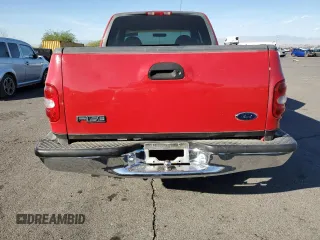 1999 Ford F-150 with VIN 1FTRX07W2XKC24186, listed as a Copart auction lot 74553294 with Not provided miles and Salvage title. Bid and sale history available at DreamBid. Image 6.