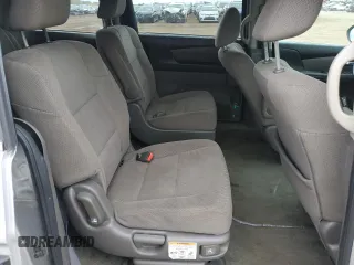2014 Honda Odyssey LX z VIN 5FNRL5H21EB106600, wystawiony jako Copart lot #57875765 z przebiegiem 122 159 mil mil oraz Szkoda całkowita • Salvage title. Historia ofert i sprzedaży dostępna na DreamBid. Obrazek 11.