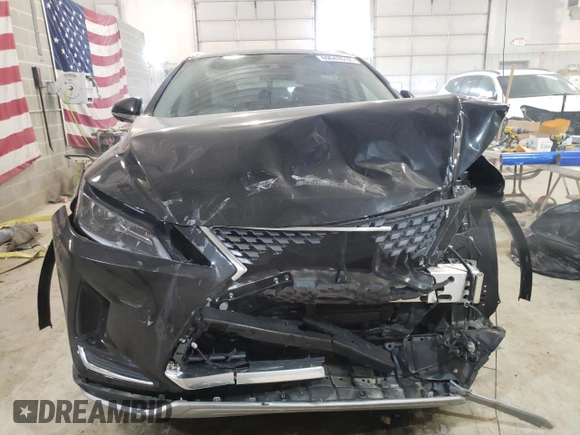 2022 Lexus RX with VIN 2T2HZMDA7NC331251, listed as a Copart auction lot 69643512 with 15,088 mi miles. Bid and sale history available at carsss.com. Image 5.