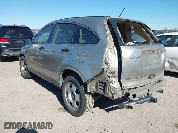 2007 Honda CR-V LX with VIN JHLRE38397C007842, listed as a IAAI auction lot 41411153 with 297,262 mi miles. Bid and sale history available at carsss.com. Image 3.