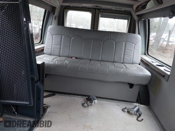 2002 Ford Econoline Cargo with VIN 1FDRE14W72HB82339, listed as a IAAI auction lot 41730429 with 214,165 mi miles and . Bid and sale history available at DreamBid. Image 8.