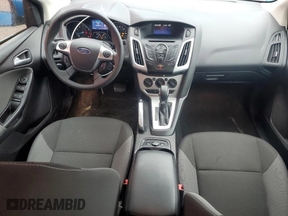 2013 Ford Focus SE z VIN 1FADP3F21DL310739, wystawiony jako Copart lot #57679325 z przebiegiem 225 860 mil mil oraz Czysty tytuł • Clean title. Historia ofert i sprzedaży dostępna na DreamBid. Obrazek 8.