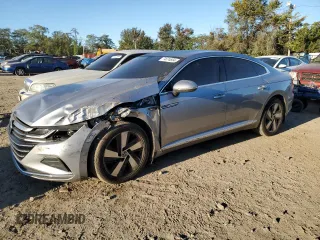 2021 Volkswagen Arteon SE с VIN WVWAR7AN2ME013418, выставлен на аукционе Copart как лот 74674664 с пробегом 56 642 миль миль и Списание • Salvage title. История ставок и продаж доступна на DreamBid. Изображение 1.