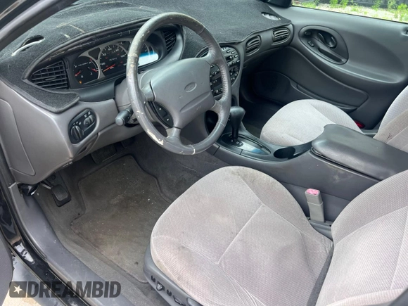 1999 Ford Taurus SE with VIN 1FAFP53SXXA145301, listed as a Copart auction lot 60351535 with 57,262 mi miles and Clean title. Bid and sale history available at DreamBid. Image 9.