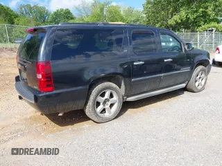 2011 Chevrolet Suburban LTZ with VIN 1GNSKKE38BR359006, listed as a IAAI auction lot 42183589 with 162,154 mi miles and . Bid and sale history available at DreamBid. Image 4.