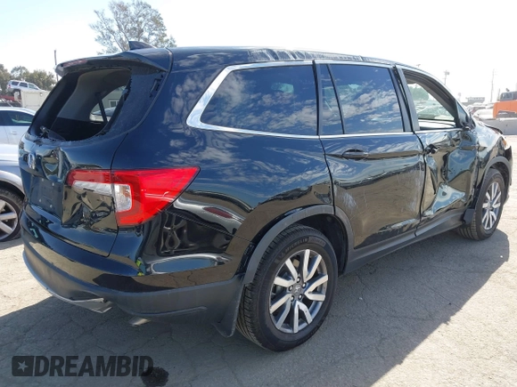 2020 Honda Pilot EX-L with VIN 5FNYF5H54LB009448, listed as a IAAI auction lot 41697106 with 63,310 mi miles. Bid and sale history available at carsss.com. Image 4.
