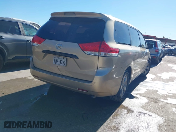 2012 Toyota Sienna with VIN 5TDKA3DC1CS011022, listed as a IAAI auction lot 41415386 with 209,552 mi miles and . Bid and sale history available at DreamBid. Image 4.