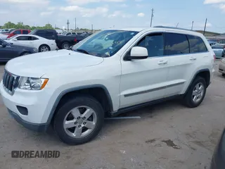 2011 Jeep Grand Cherokee 70th Anniversary with VIN 1J4RR4GG4BC562003, listed as a IAAI auction lot 42022419 with 231,786 mi miles. Bid and sale history available at carsss.com. Image 14.