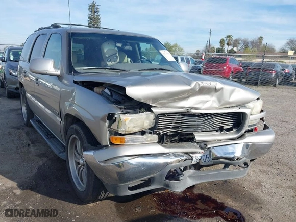 2001 GMC Yukon SLT with VIN 1GKEC13TX1J138735, listed as a IAAI auction lot 41719311 with 211,190 mi miles. Bid and sale history available at carsss.com. Image 1.