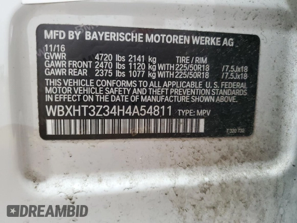 2017 BMW X1 xDrive28i with VIN WBXHT3Z34H4A54811, listed as a Copart auction lot 63584405 with 92,699 mi miles and Salvage title. Bid and sale history available at DreamBid. Image 14.