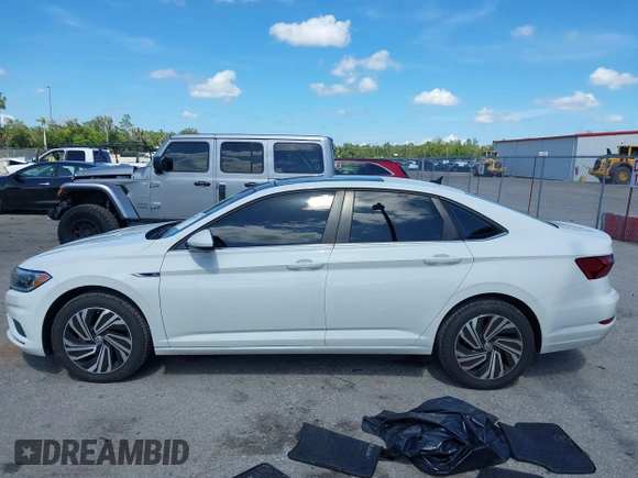 2021 Volkswagen Jetta SEL with VIN 3VWE57BU2MM047028, listed as a IAAI auction lot 42563875 with 56,695 mi miles and . Bid and sale history available at DreamBid. Image 14.