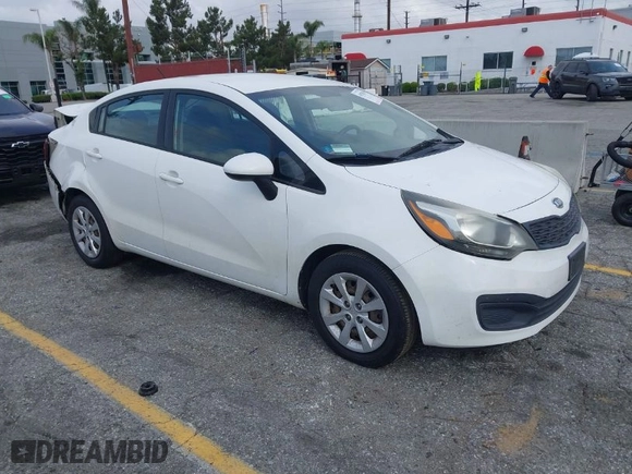 2012 Kia Rio LX with VIN KNADM4A31C6089842, listed as a IAAI auction lot 41928559 with 129,030 mi miles. Bid and sale history available at carsss.com. Image 1.