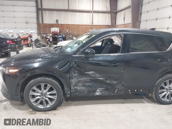 2024 Mazda CX-5 2.5 S Premium Package with VIN JM3KFBDMXR0351289, listed as a IAAI auction lot 41657792 with 22,260 mi miles. Bid and sale history available at carsss.com. Image 6.