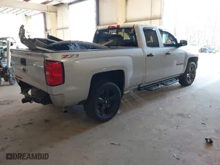 2017 Chevrolet Silverado 1500 LT with VIN 1GCVKREC5HZ252129, listed as a IAAI auction lot 41527539 with 135,982 mi miles. Bid and sale history available at carsss.com. Image 4.