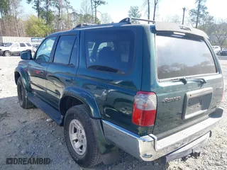 2000 Toyota 4Runner SR5 with VIN JT3HN86R6Y0305155, listed as a IAAI auction lot 41890566 with 223,502 mi miles. Bid and sale history available at carsss.com. Image 3.