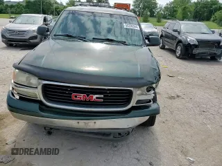 2002 GMC Yukon SLE z VIN 1GKEC13Z22R152796, wystawiony jako Copart lot #55330344 z przebiegiem 337 318 mil mil oraz Szkoda całkowita • Salvage title. Historia ofert i sprzedaży dostępna na DreamBid. Obrazek 11.