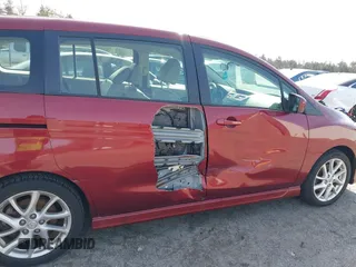 2012 Mazda 5 Grand Touring with VIN JM1CW2DL3C0144402, listed as a IAAI auction lot 41923524 with 150,584 mi miles and . Bid and sale history available at DreamBid. Image 6.