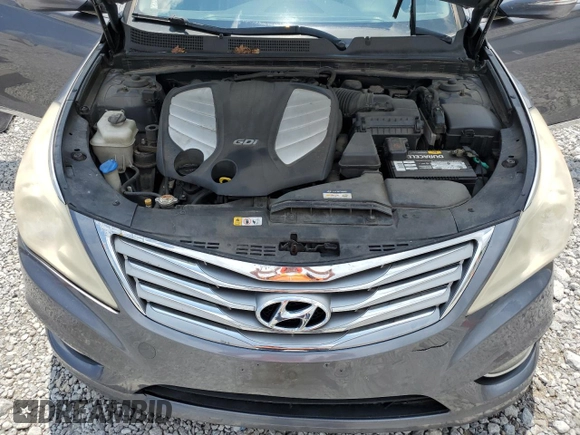 2013 Hyundai Azera z VIN KMHFG4JG9DA254147, wystawiony jako Copart lot #64744425 z przebiegiem 173 015 mil mil oraz Szkoda całkowita • Salvage title. Historia ofert i sprzedaży dostępna na DreamBid. Obrazek 11.