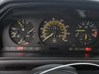 1986 Mercedes-Benz 300 E with VIN WDBEA30D0GA220989, listed as a Copart auction lot 86298874 with 74,521 mi miles and Clean Title. Bid and sale history available at carsss.com. Image 9.