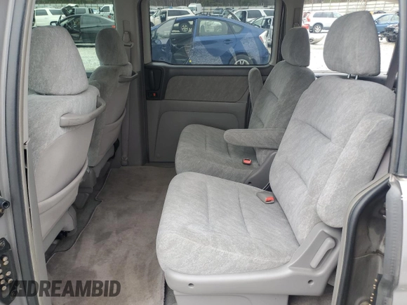 2000 Honda Odyssey EX with VIN 2HKRL1865YH513885, listed as a Copart auction lot 50223505 with 214,627 mi miles and Salvage Title. Bid and sale history available at DreamBid. Image 12.