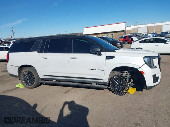 2021 GMC Yukon XL Denali with VIN 1GKS2JKT1MR401207, listed as a IAAI auction lot 41242619 with 87,902 mi miles and . Bid and sale history available at carsss.com. Image 13.