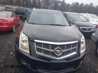2012 Cadillac SRX Performance Collection z VIN 3GYFNBE39CS641892, wystawiony jako IAAI lot #41395695 z przebiegiem 95 303 mil mil oraz . Historia ofert i sprzedaży dostępna na DreamBid. Obrazek 6.