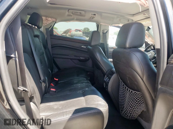 2012 Cadillac SRX Performance Collection with VIN 3GYFNBE34CS609643, listed as a Copart auction lot 57223065 with 182,072 mi miles and Salvage title. Bid and sale history available at DreamBid. Image 11.